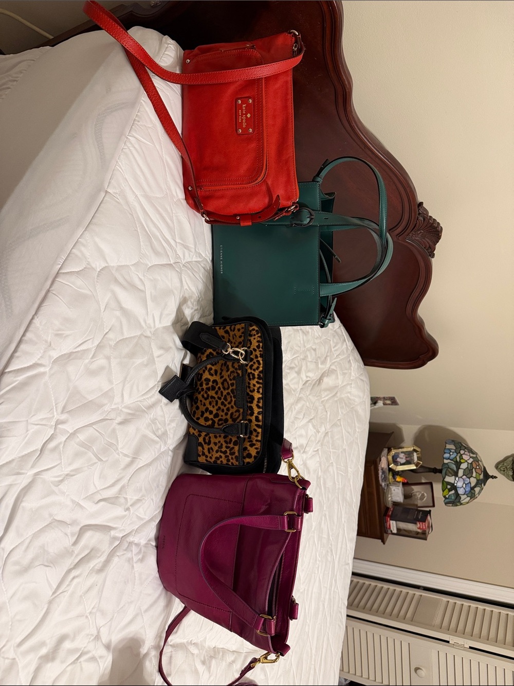 kate spade red suede shoulder bag with gold-tone plaque